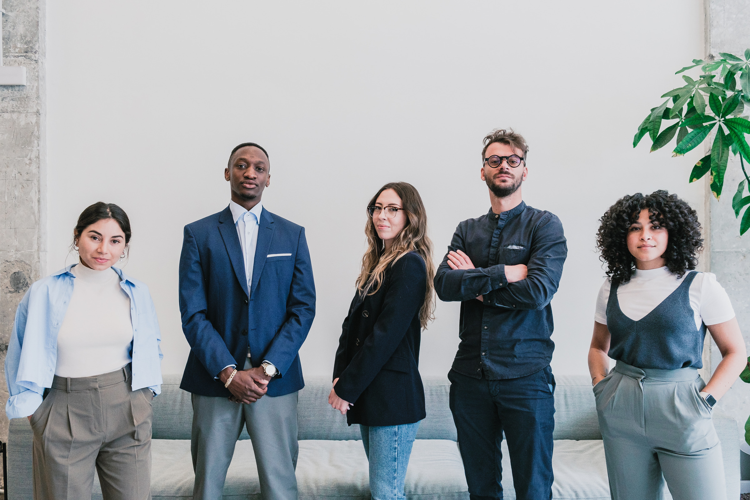 The diverse TinChang Digital team standing together